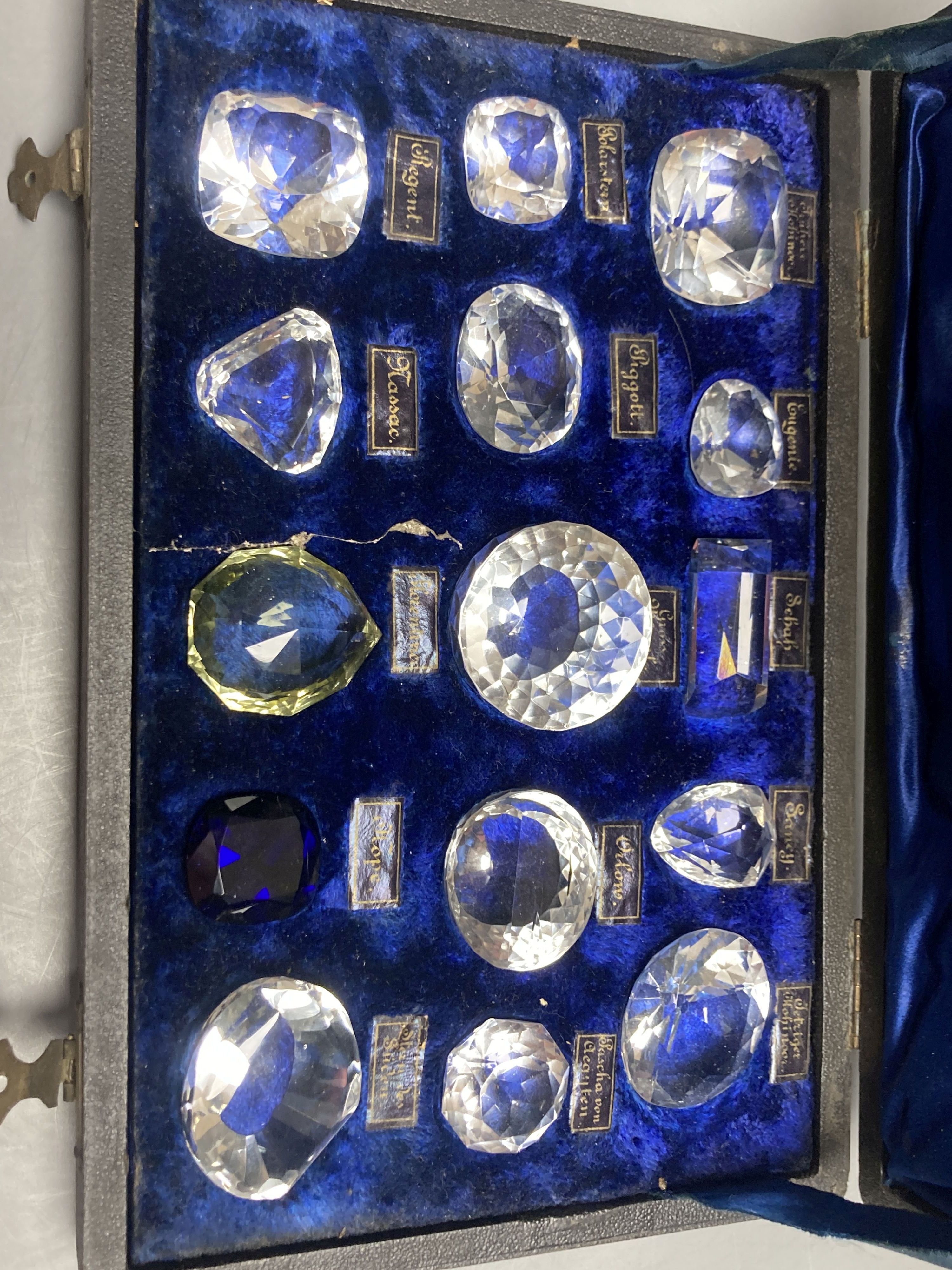 A collection of fifteen assorted simulated famous diamonds, in fitted case.